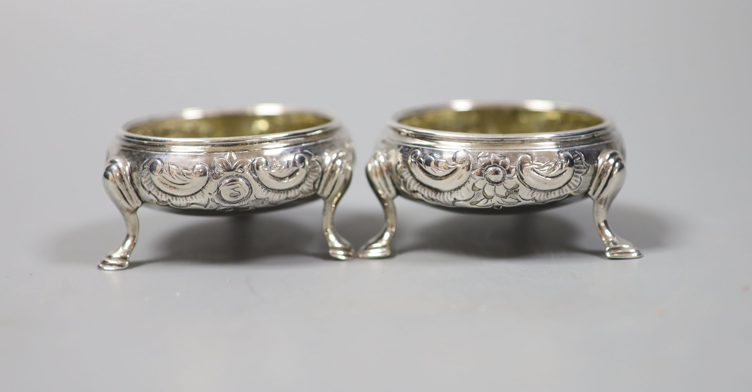 A pair of George III silver bun salts, with later decoration, London, 1766, 66mm, 98 grams.